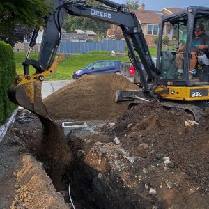 35G John Deere getting utilities in the ground